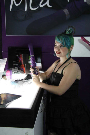  sexy girl holding toy at sexpo 